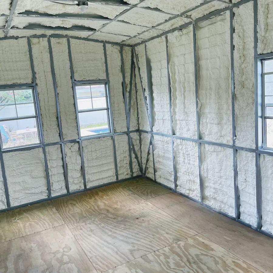 Closed-cell spray foam insulation applied to wall cavities in a residential project in Hilliard